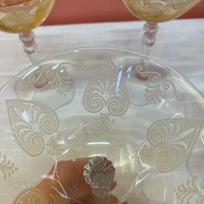 Sale Photo Thumbnail #75: Amazing pieces of Trojan Topaz designed Fostoria glassware, produced 1929-1936. Gorgeous yellow topaz color and clarity. Some pieces may have minor chips due to age. Gorgeous etched design. 
Set includes: 5 martini glasses