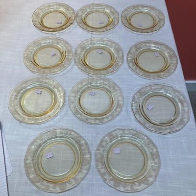 Sale Photo Thumbnail #82: Amazing pieces of Trojan Topaz designed Fostoria glassware, produced 1929-1936. Gorgeous yellow topaz color and clarity. Some pieces may have minor chips due to age. Gorgeous etched design. 
Set includes: 11  6" appetizer/snack plates