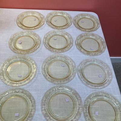 Sale Photo Thumbnail #85: Amazing pieces of Trojan Topaz designed Fostoria glassware, produced 1929-1936. Gorgeous yellow topaz color and clarity. Some pieces may have minor chips due to age. Gorgeous etched design. 
Set includes: 12 salad plates, 7" wide
