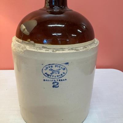 Sale Photo Thumbnail #102: A great Texas/DFW historic find. This large whiskey jug was made by Love Field Pottery (1923-mid-century)
**FYI...if you want it shipped, it's HEAVY!