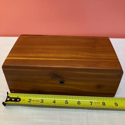 Sale Photo Thumbnail #107: This small Lane cedar chest/box was a salesman sample box! So cute and has the original card identifying it as a salesman sample. It is in great condition!