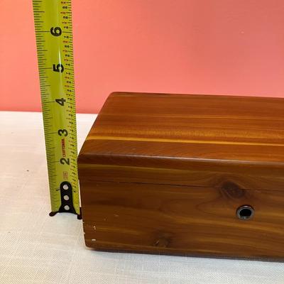 Sale Photo Thumbnail #108: This small Lane cedar chest/box was a salesman sample box! So cute and has the original card identifying it as a salesman sample. It is in great condition!