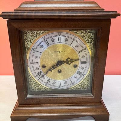 Sale Photo Thumbnail #124: This beautiful Howard Miller Bracket Mantel Clock works and is in excellent condition! Comes with winding key and original owners instructions.