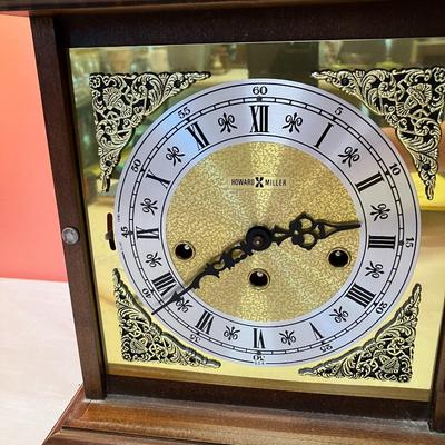 Sale Photo Thumbnail #125: This beautiful Howard Miller Bracket Mantel Clock works and is in excellent condition! Comes with winding key and original owners instructions.