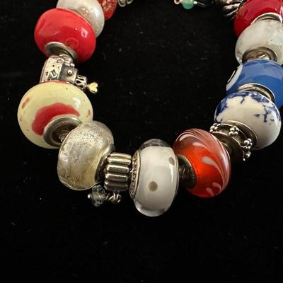 PANDORA BRACELET/SOME CHARMS ARE 925 SILVER AND EXTRA CHARMS