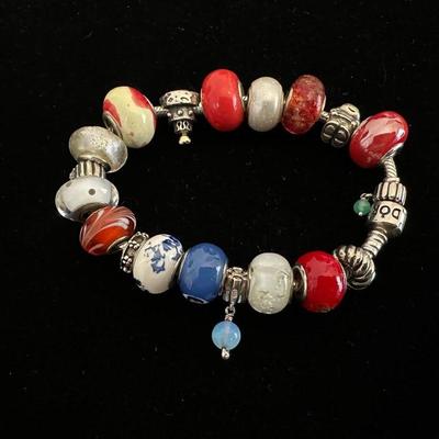 PANDORA BRACELET/SOME CHARMS ARE 925 SILVER AND EXTRA CHARMS