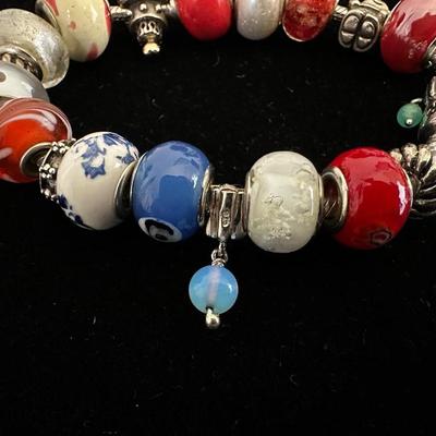 PANDORA BRACELET/SOME CHARMS ARE 925 SILVER AND EXTRA CHARMS