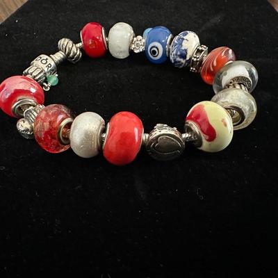 PANDORA BRACELET/SOME CHARMS ARE 925 SILVER AND EXTRA CHARMS