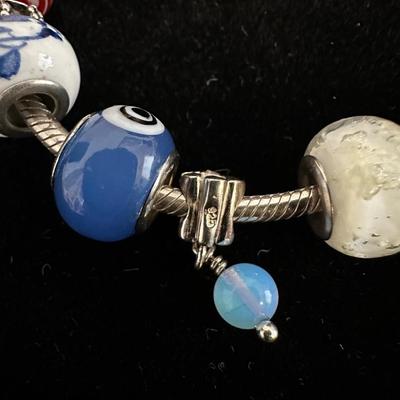 PANDORA BRACELET/SOME CHARMS ARE 925 SILVER AND EXTRA CHARMS
