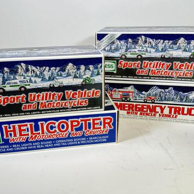 LOT 121: Collection of New in Box Hess Trucks