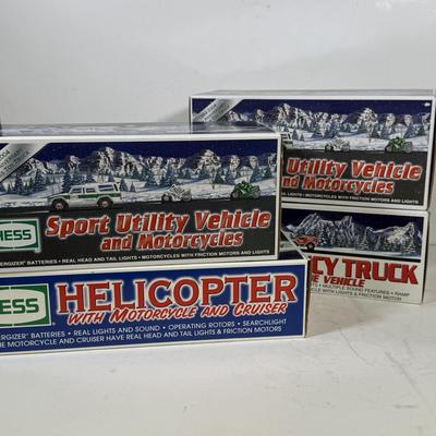LOT 121: Collection of New in Box Hess Trucks
