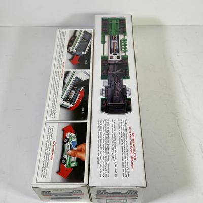 LOT 122: Collection of New in Box Hess Trucks