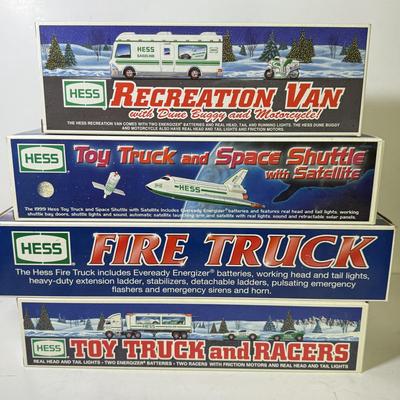 LOT 124: Collection of New in Box Hess Trucks