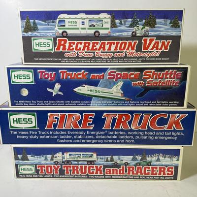 LOT 124: Collection of New in Box Hess Trucks