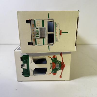 LOT 125: Collection of New Hess Trucks in Box