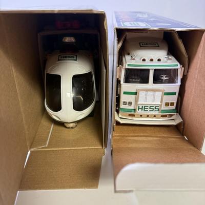 LOT 125: Collection of New Hess Trucks in Box
