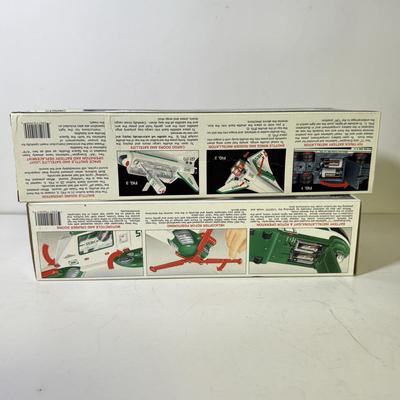 LOT 125: Collection of New Hess Trucks in Box