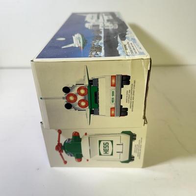 LOT 125: Collection of New Hess Trucks in Box