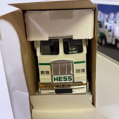 LOT 125: Collection of New Hess Trucks in Box