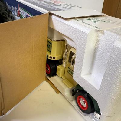 LOT 125: Collection of New Hess Trucks in Box
