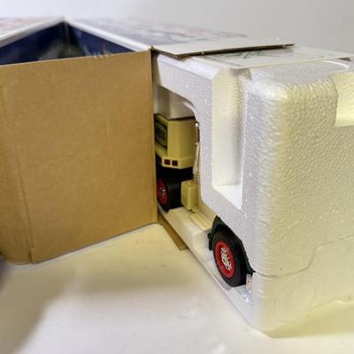 LOT 125: Collection of New Hess Trucks in Box