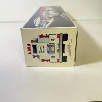 LOT 125: Collection of New Hess Trucks in Box