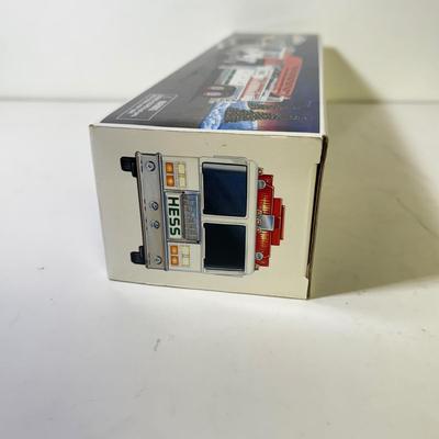 LOT 125: Collection of New Hess Trucks in Box
