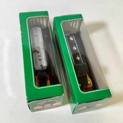 LOT 126B: Collection of New Hess Trucks in Box