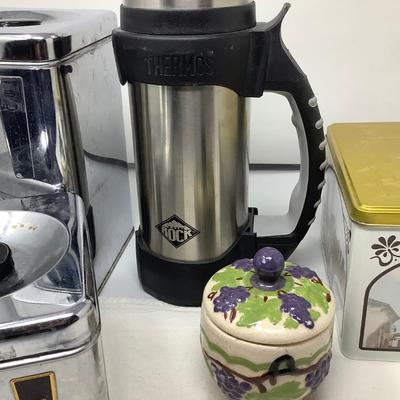 Sale Photo Thumbnail #136: Two metal canisters, nice thermos, large tin, and jam holder