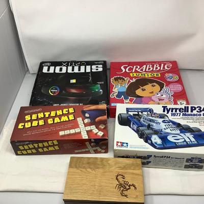 Sale Photo Thumbnail #122: Scrabble Jr, Sentence Cube Game, Simon Optic, Tyrell Car Model, Dominoes Boxxset.