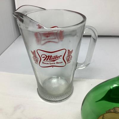 Sale Photo Thumbnail #151: Miller beer pitcher, glass decanter, and wine jug.