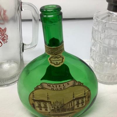 Sale Photo Thumbnail #150: Miller beer pitcher, glass decanter, and wine jug.