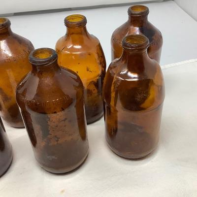 Sale Photo Thumbnail #158: 8 brown beer bottles