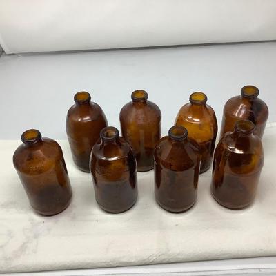 Sale Photo Thumbnail #153: 8 brown beer bottles