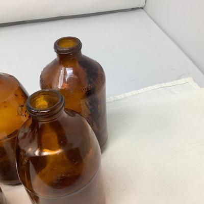 Sale Photo Thumbnail #155: 8 brown beer bottles