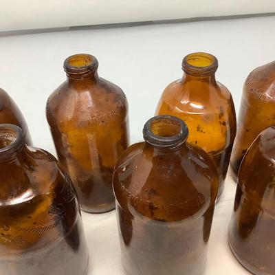 Sale Photo Thumbnail #156: 8 brown beer bottles