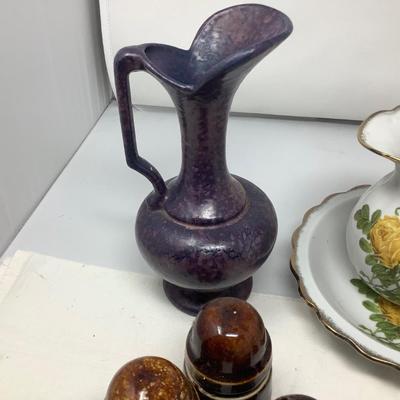 Sale Photo Thumbnail #59: Purple pitcher, yellow flower picture and bowl, 3 brown insulators, bear figurine.