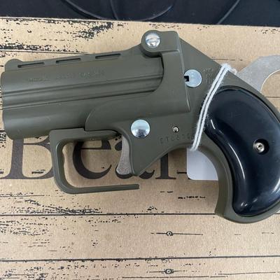 Sale Photo Thumbnail #254: Action: Single-action over/under derringer

Barrel Length: 2.75 inches

Overall Length: 4.65 inches

Height: Approximately 3 inches

Width: Approximately 1 inch

Weight: 14 oz

Capacity: 2-round double-barrel

Frame Material: Alloy

Sights: Fixed front bl