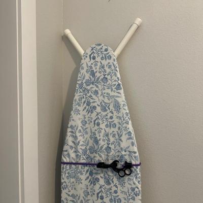 IRON, IRONING BOARD WITH PRESSING SLEEVES