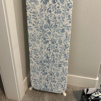 IRON, IRONING BOARD WITH PRESSING SLEEVES