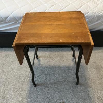 TYPEWRITER TABLE ON METAL CASTERS