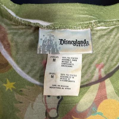 Sale Photo Thumbnail #373: Light-green with idealized 1955 images of the Disneyland Park. Good lightly-used condition.