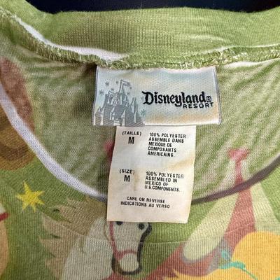 Sale Photo Thumbnail #372: Light-green with idealized 1955 images of the Disneyland Park. Good lightly-used condition.