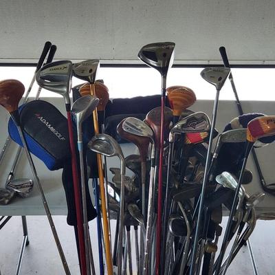 Sale Photo Thumbnail #86: Huge Golf Club Lot. All in good condition and higher end clubs kept in sleeves. Over 60 clubs. 
Ping, Big Bertha, Cobra and so many more.