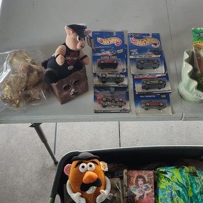 Sale Photo Thumbnail #90: You will receive all items pictured plus different items that will be in tote. Items like Movies, vintage shirts and pants other toys

***Bin Not Included***