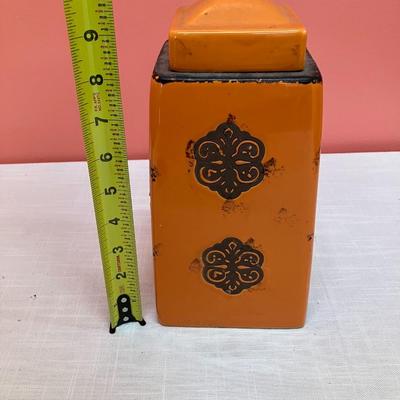 Sale Photo Thumbnail #210: This cute orange ceramic canister is great for cookies or storing all kinds of things
