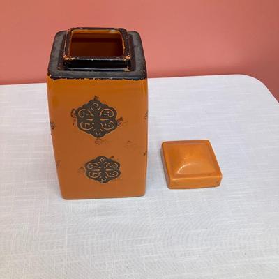 Sale Photo Thumbnail #211: This cute orange ceramic canister is great for cookies or storing all kinds of things