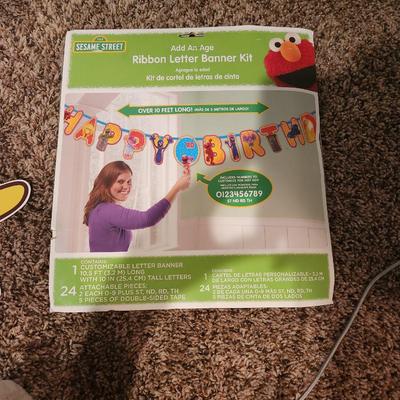Sale Photo Thumbnail #120: Whole Sesame Street crew head decoration w/ "Happy Birthday" lettering in packaging brand new.