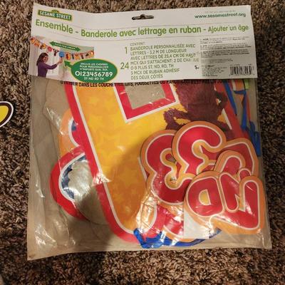 Sale Photo Thumbnail #119: Whole Sesame Street crew head decoration w/ "Happy Birthday" lettering in packaging brand new.