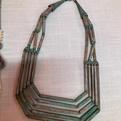 Sale Photo Thumbnail #281: 3 necklaces: 2 copper with natural patina and 1 silver plate with authentic bone (bovine or deer) beads